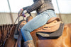 Ein Westernsattel mit Westernpad auf einem Westernpferd